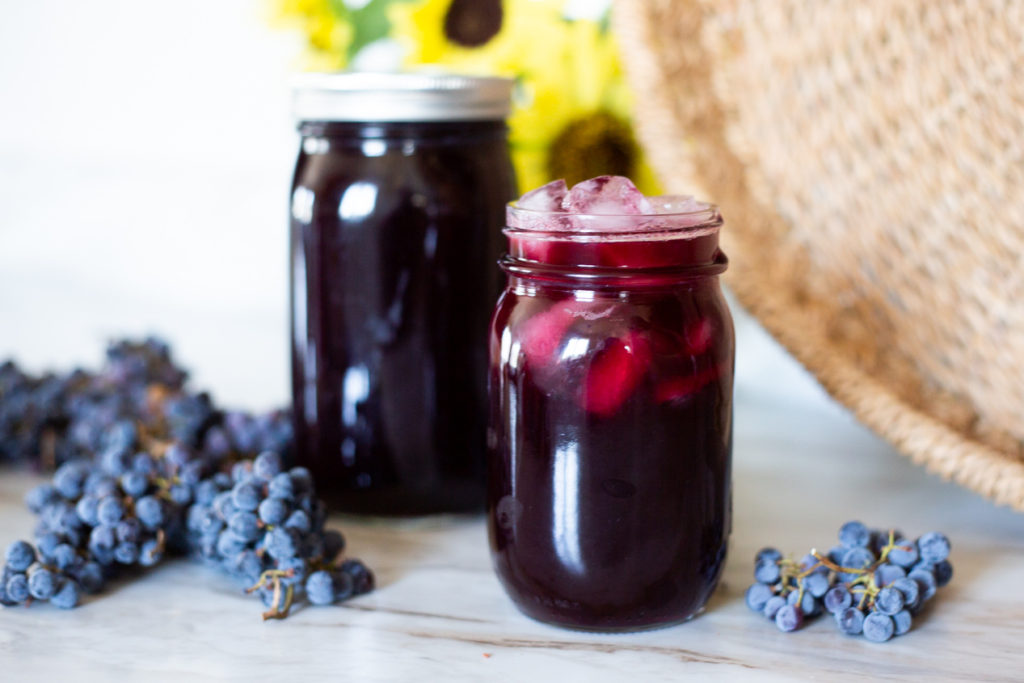 grape juice with ice sitting on counter