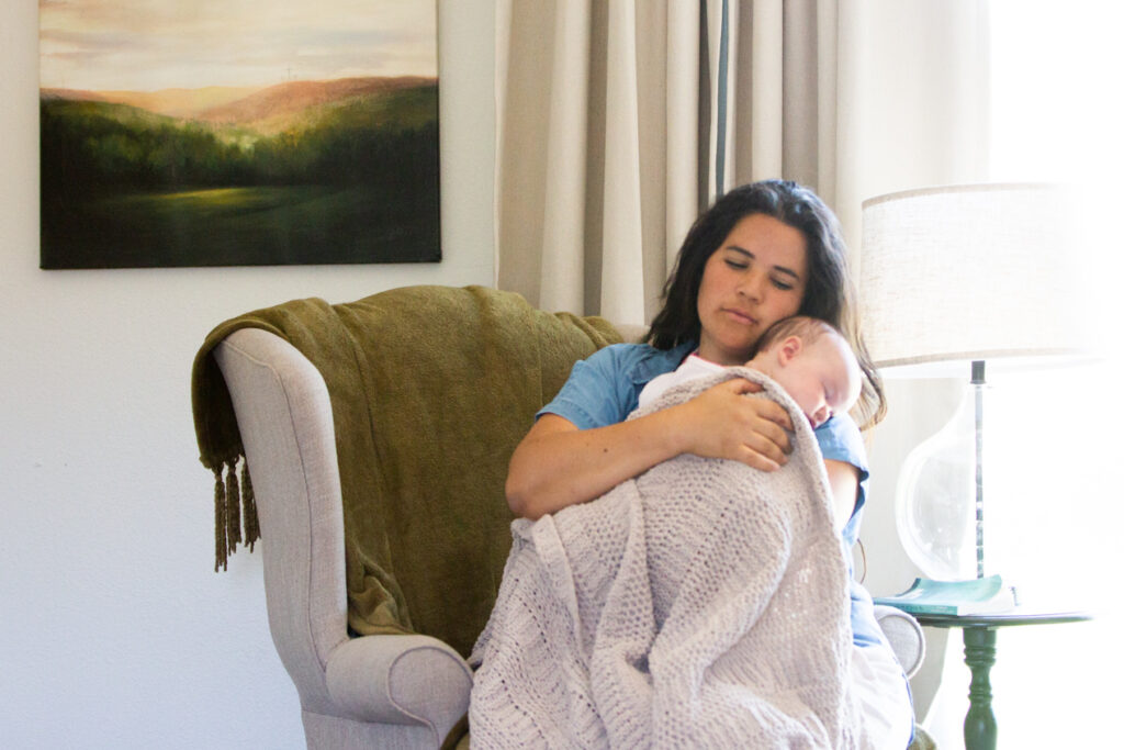 woman holding baby