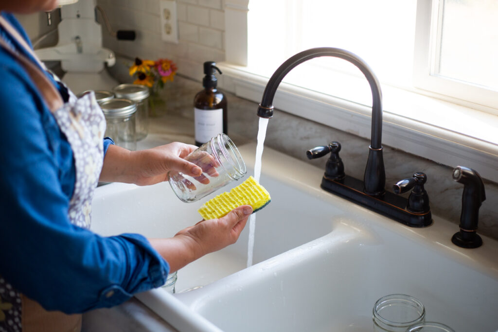 hands washing dishes 