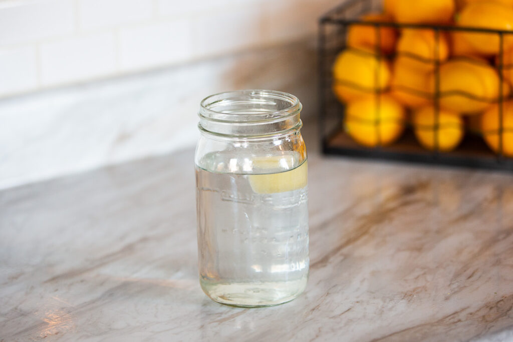 frozen lemon juice cube in water 