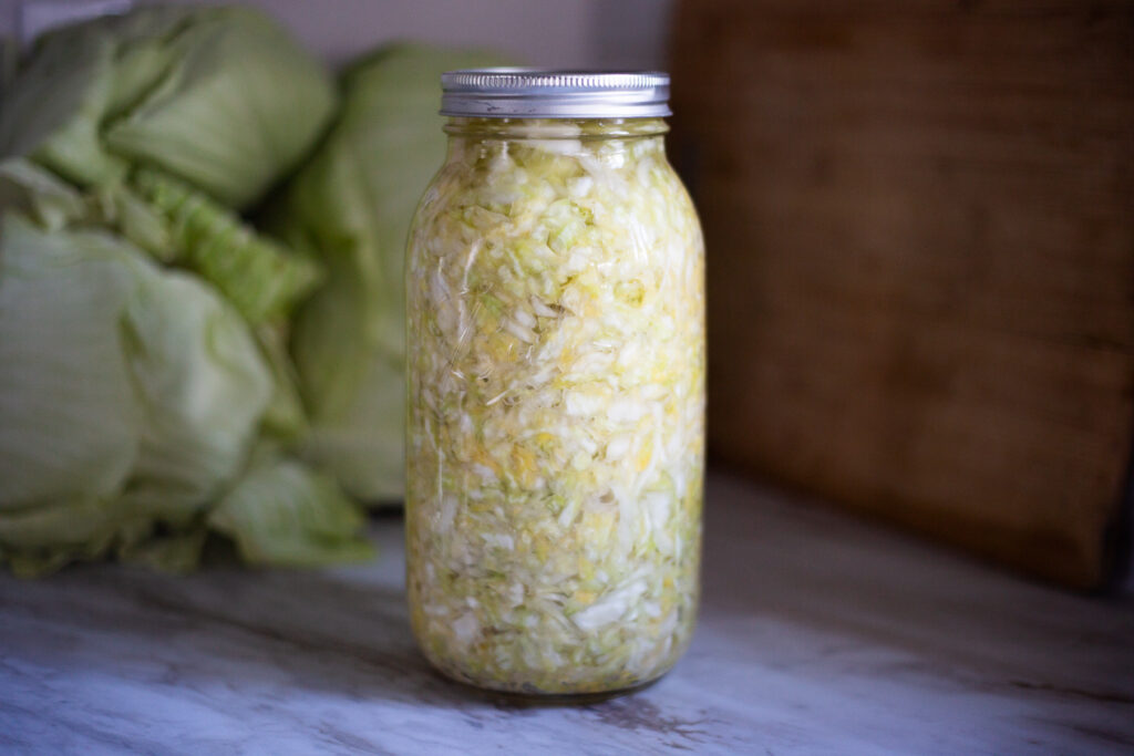 jar of sauerkraut sitting on counter